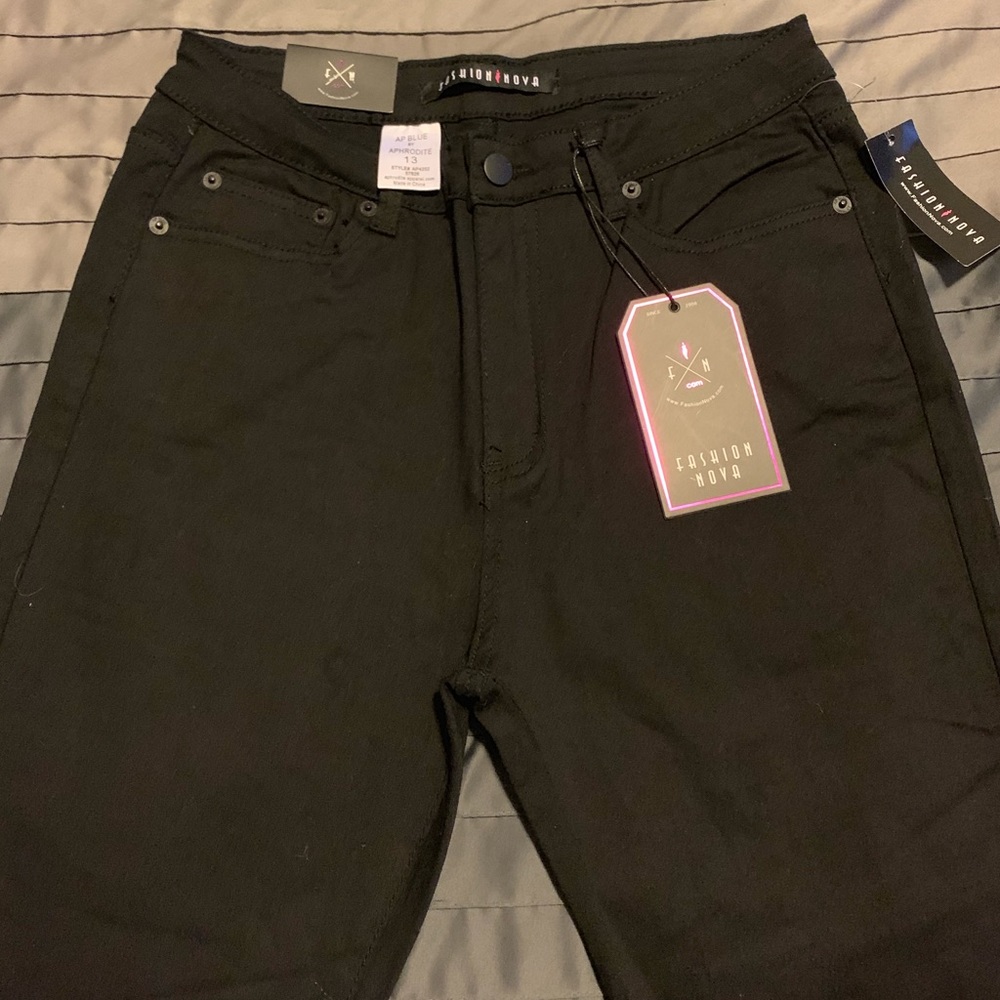 Black, high-waisted Fashion Nova skinny jeans